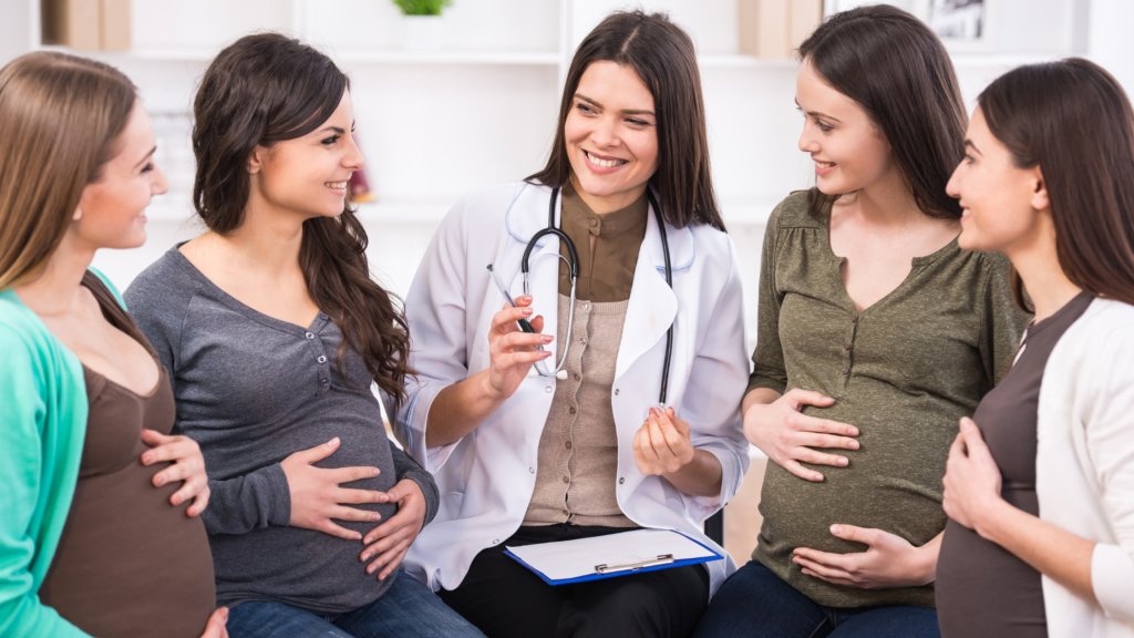 group of pregnant moms consulting with a dietician